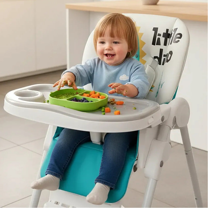 Silla Comedor Kidshop Doble Bandeja Plegable Dinosaurio Turquesa