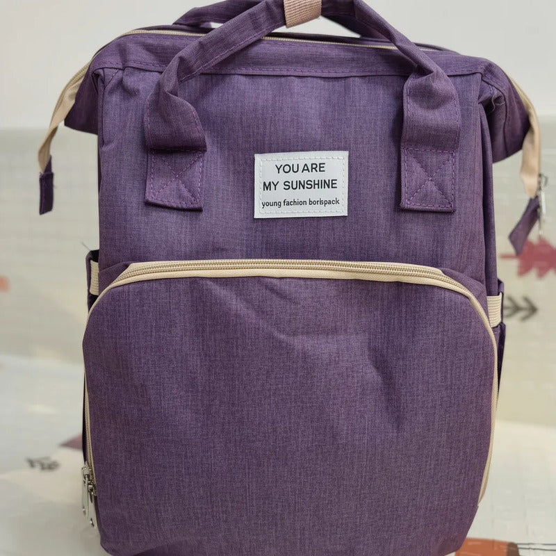 Pañalera Tipo Morral  Con Bolsillos Termicos Y Cambiador Morado Lisa