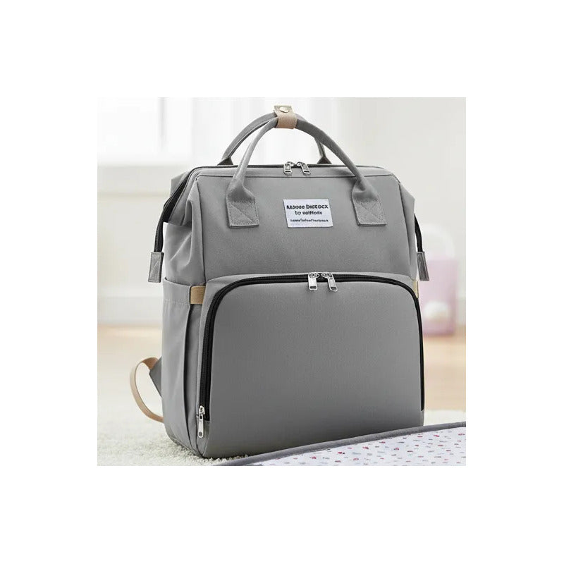 Pañalera Tipo Morral  Con Bolsillos Termicos Y Cambiador Gris Liso
