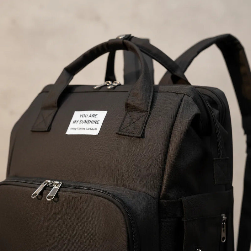 Pañalera Tipo Morral  Con Bolsillos Termicos Y Cambiador Negro Liso